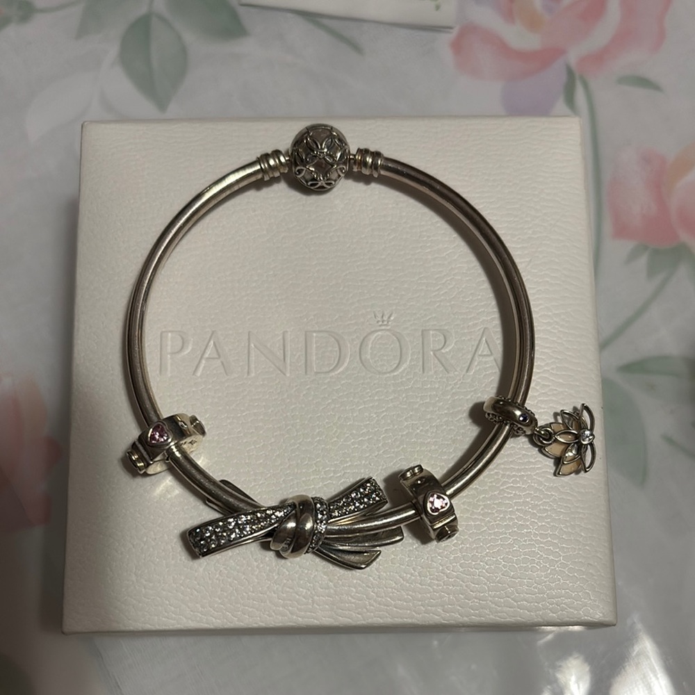 Pandora Sterling silver bangle with oversized bow charm, 2 clips and 1 charm